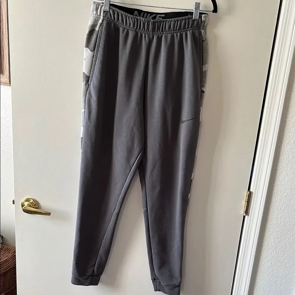 Nike Gray Sweatpants with Elastic Waistband and Tapered Legs